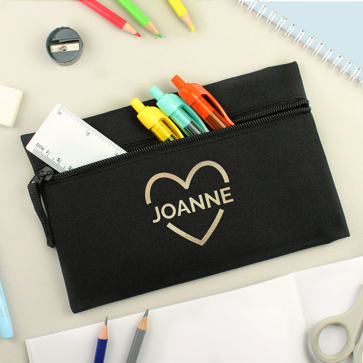 Buy Personalised Gold Heart Black Pencil Case at www.giftsfinder.co.uk