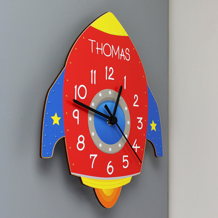 Buy Personalised Rocket Shape Wooden Clock at www.giftsfinder.co.uk