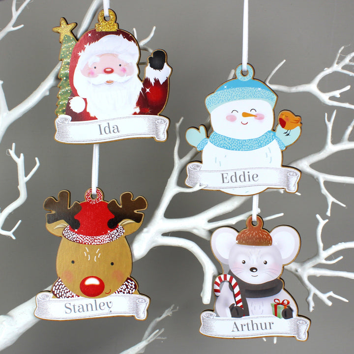 Buy Personalised Set of Four Colourful Christmas Characters Wooden Hanging Decorations at www.giftsfinder.co.uk