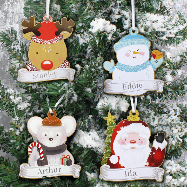 Buy Personalised Set of Four Colourful Christmas Characters Wooden Hanging Decorations at www.giftsfinder.co.uk