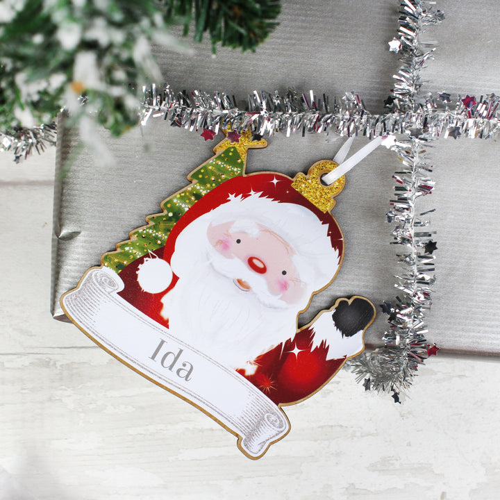 Buy Personalised Set of Four Colourful Christmas Characters Wooden Hanging Decorations at www.giftsfinder.co.uk