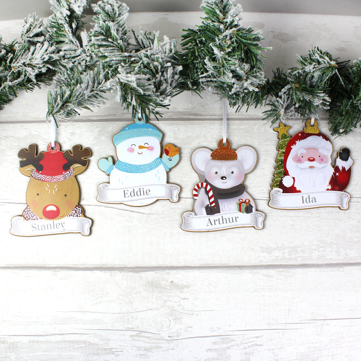 Buy Personalised Set of Four Colourful Christmas Characters Wooden Hanging Decorations at www.giftsfinder.co.uk