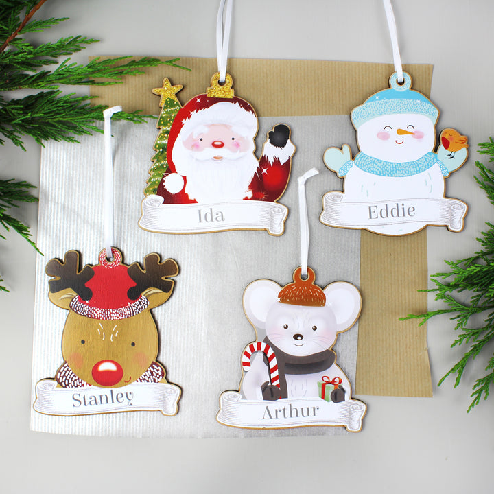 Buy Personalised Set of Four Colourful Christmas Characters Wooden Hanging Decorations at www.giftsfinder.co.uk