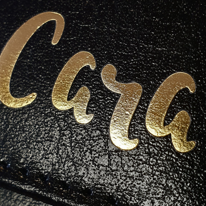 Buy Personalised Gold Name Black Purse at www.giftsfinder.co.uk