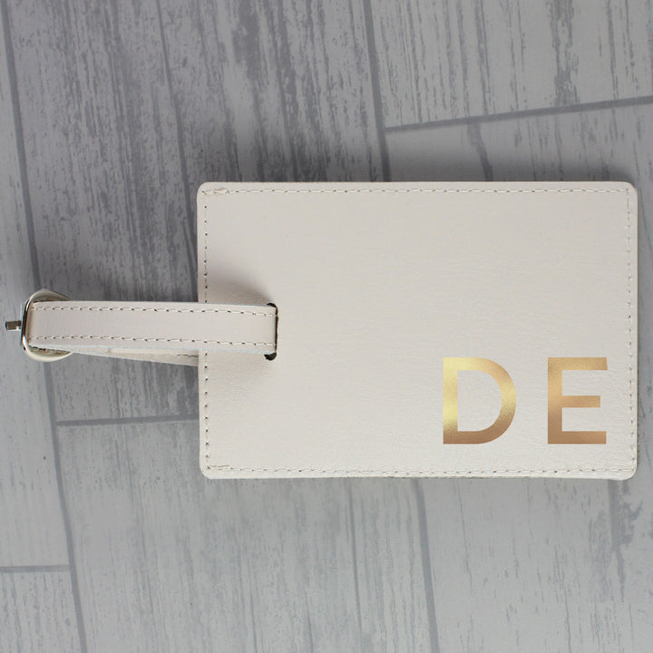 Buy Personalised Gold Initials Cream Luggage Tag at www.giftsfinder.co.uk