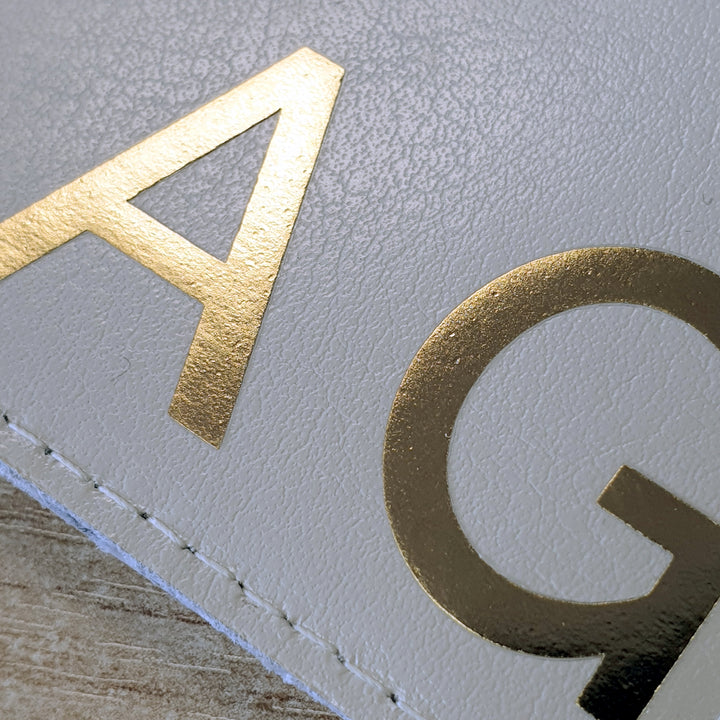 Buy Personalised Gold Initials Cream Luggage Tag at www.giftsfinder.co.uk