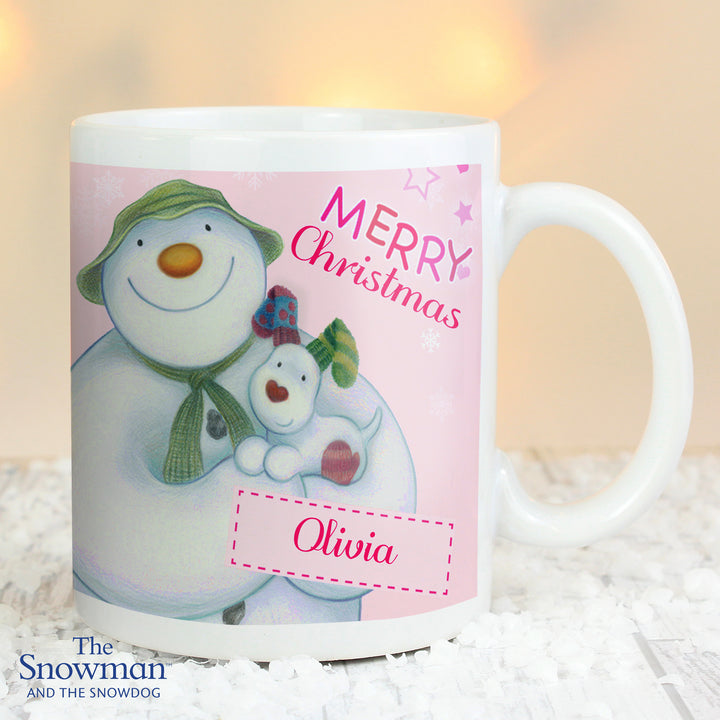 Buy Personalised The Snowman and the Snowdog Pink Mug at www.giftsfinder.co.uk