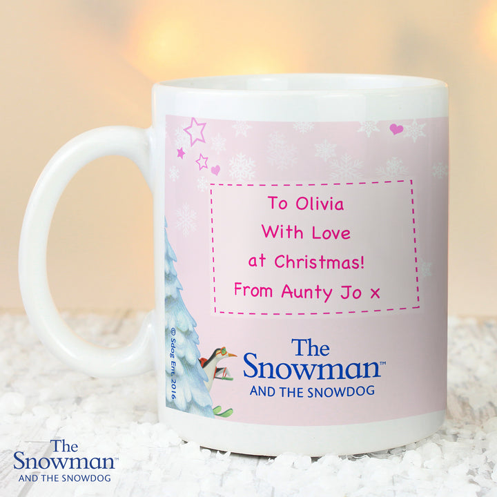 Buy Personalised The Snowman and the Snowdog Pink Mug at www.giftsfinder.co.uk