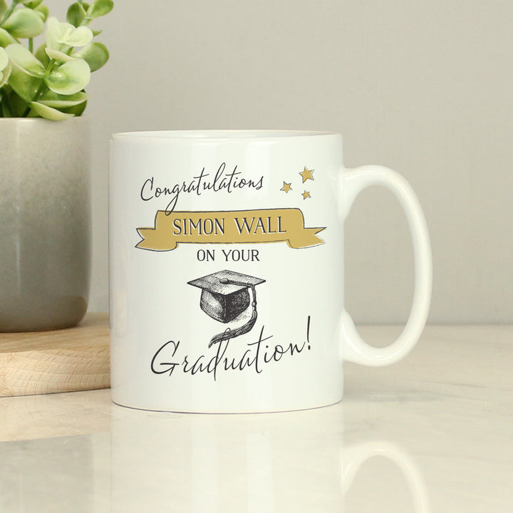 Buy Personalised Gold Star Graduation Mug at www.giftsfinder.co.uk