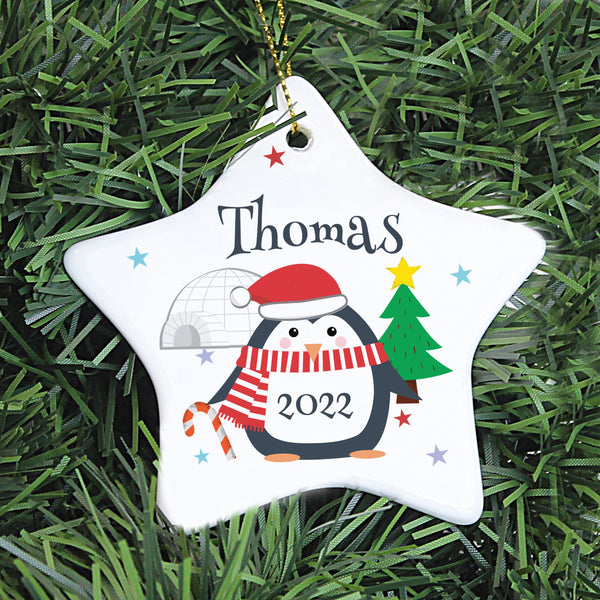 Buy Personalised Christmas Penguin Ceramic Star Decoration available now at www.giftsfinder.co.uk