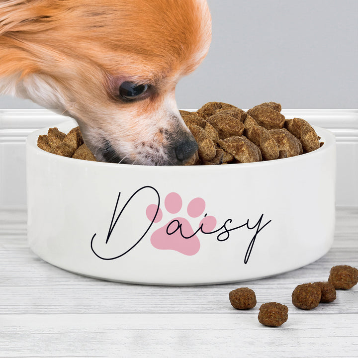 Buy Personalised Pink Pawprint Name 14cm Medium Pet Bowl For Dogs And Cats at www.giftsfinder.co.uk