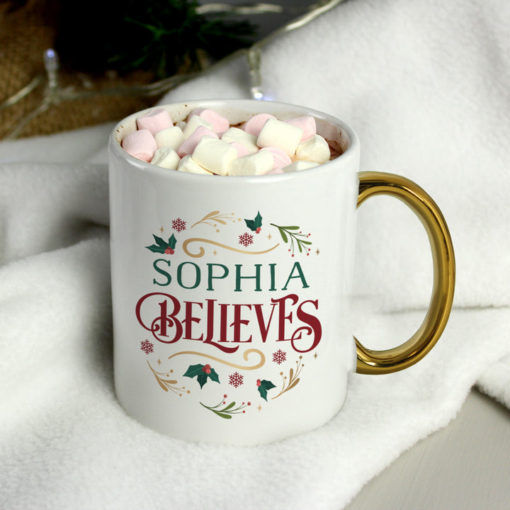 Buy Personalised Believes In Christmas Gold Handled Mug available now at www.giftsfinder.co.uk