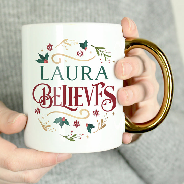 Buy Personalised Believes In Christmas Gold Handled Mug available now at www.giftsfinder.co.uk