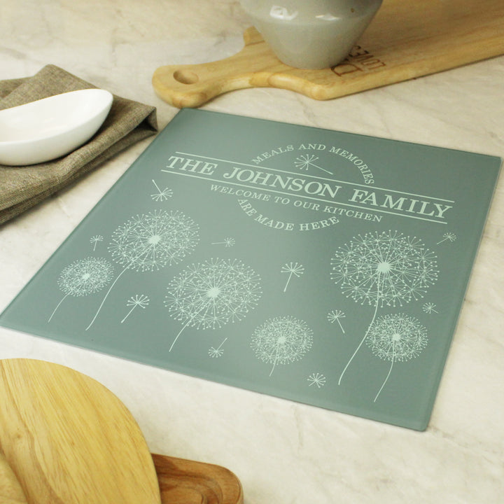 Buy Personalised Dandelion Glass Chopping Board/Worktop Saver available now at www.giftsfinder.co.uk