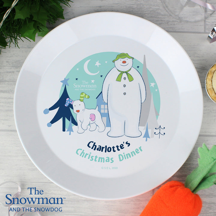 Buy Personalised The Snowman and the Snowdog Plastic Plate at www.giftsfinder.co.uk