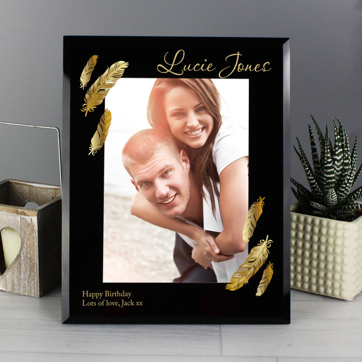 Buy Personalised Golden Feather 5x7 Black Glass Photo Frame at www.giftsfinder.co.uk