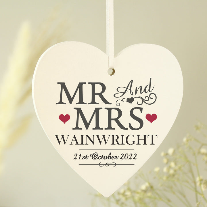 Buy Personalised Mr & Mrs Wooden Heart Decoration at www.giftsfinder.co.uk