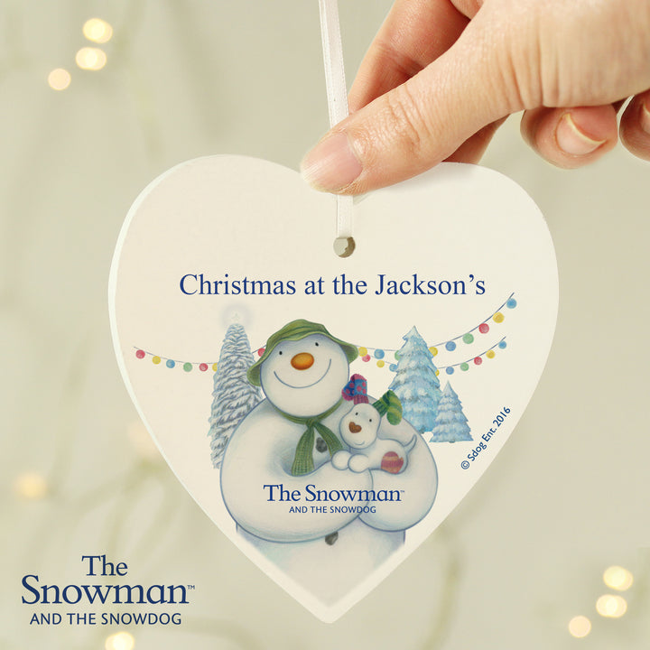 Buy Personalised The Snowman and the Snowdog Wooden Heart Decoration at www.giftsfinder.co.uk