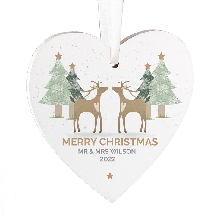 Buy Personalised Reindeer Couple Wooden Heart Decoration at www.giftsfinder.co.uk