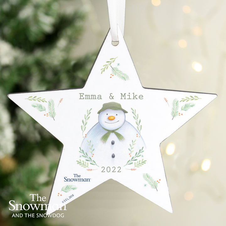 Buy Personalised The Snowman Winter Garden Wooden Star Decoration at www.giftsfinder.co.uk