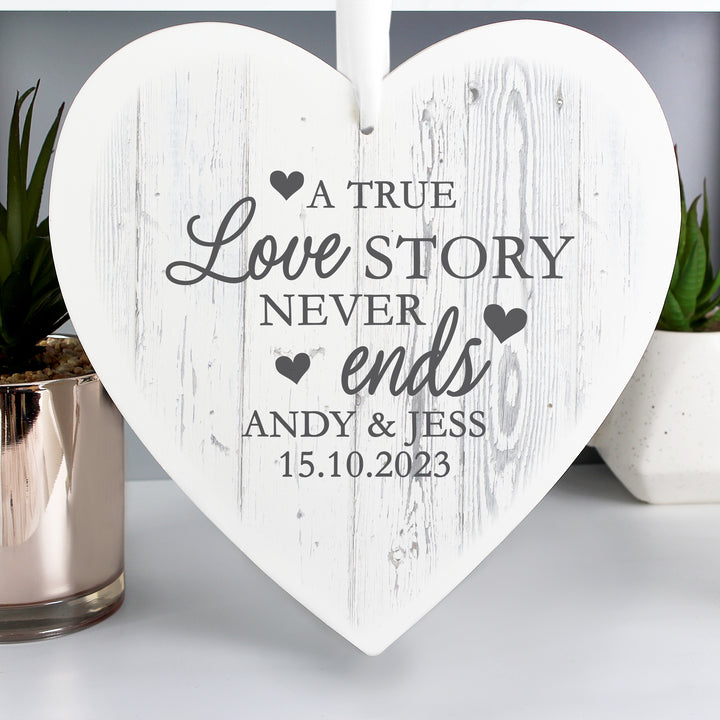 Buy Personalised Love Story Large Wooden Heart Decoration at www.giftsfinder.co.uk