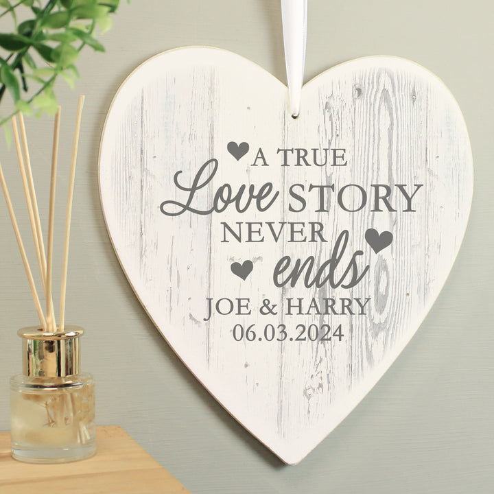 Buy Personalised Love Story Large Wooden Heart Decoration at www.giftsfinder.co.uk