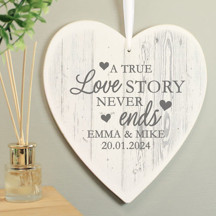 Buy Personalised Love Story Large Wooden Heart Decoration at www.giftsfinder.co.uk