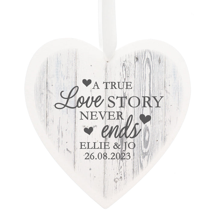 Buy Personalised Love Story Large Wooden Heart Decoration at www.giftsfinder.co.uk