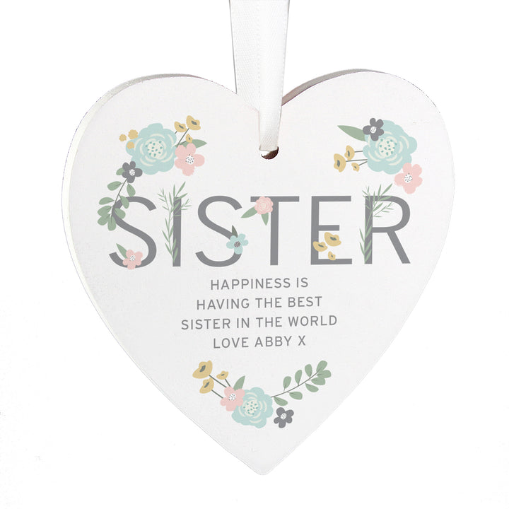 Buy Personalised Sister Floral Wooden Heart Decoration at www.giftsfinder.co.uk