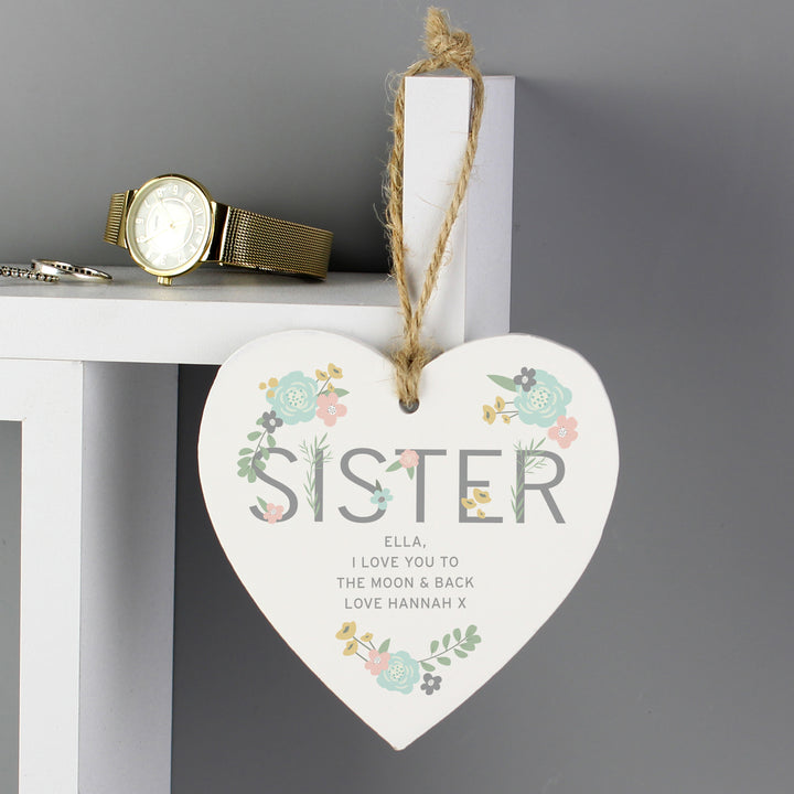 Buy Personalised Sister Floral Wooden Heart Decoration at www.giftsfinder.co.uk