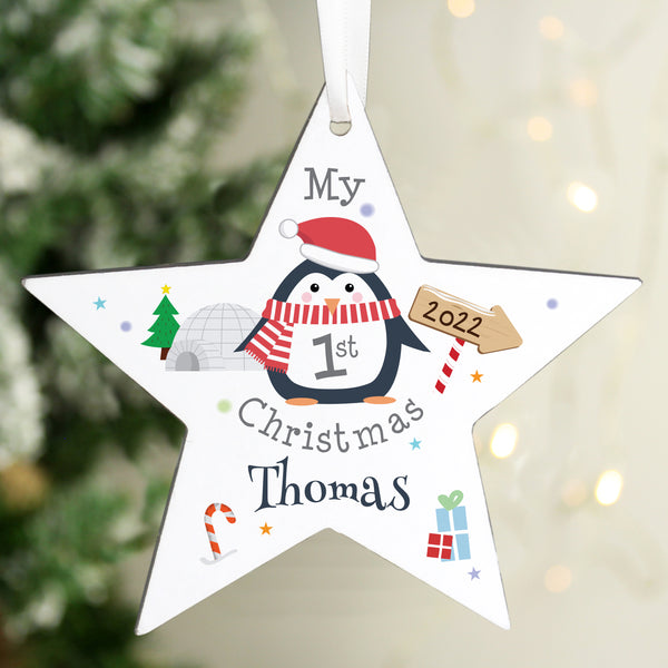 Buy Personalised 1st Christmas Penguin Wooden Star Decoration available now at www.giftsfinder.co.uk