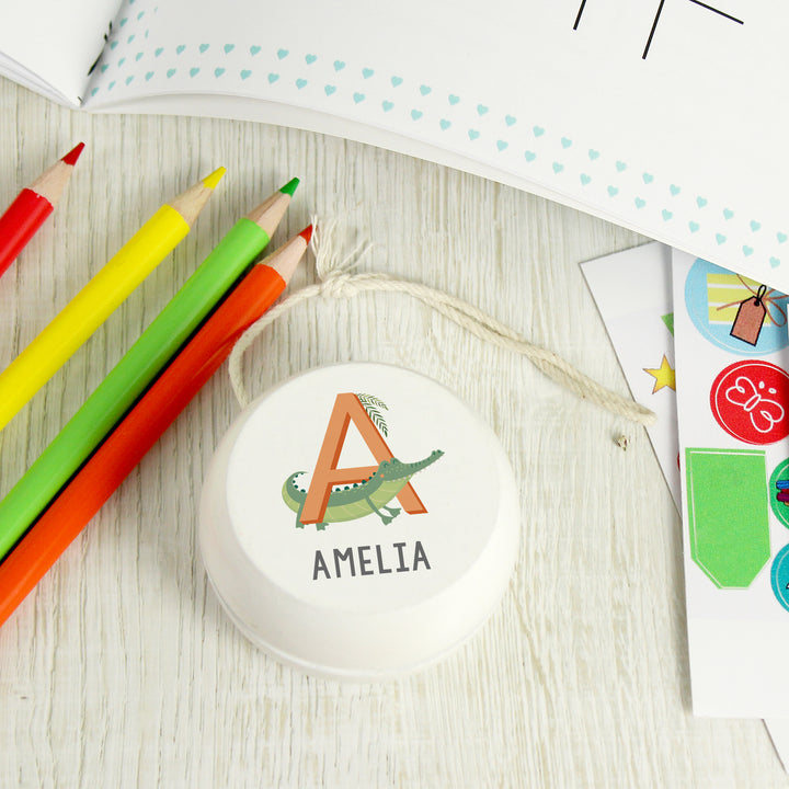 Buy Personalised Animal Alphabet White Wooden Yoyo available now at www.giftsfinder.co.uk