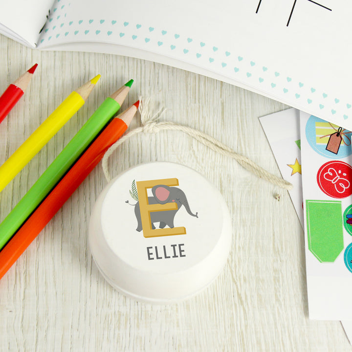 Buy Personalised Animal Alphabet White Wooden Yoyo available now at www.giftsfinder.co.uk