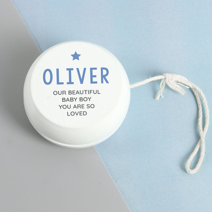 Buy Personalised Blue Star White Wooden Yoyo available now at www.giftsfinder.co.uk