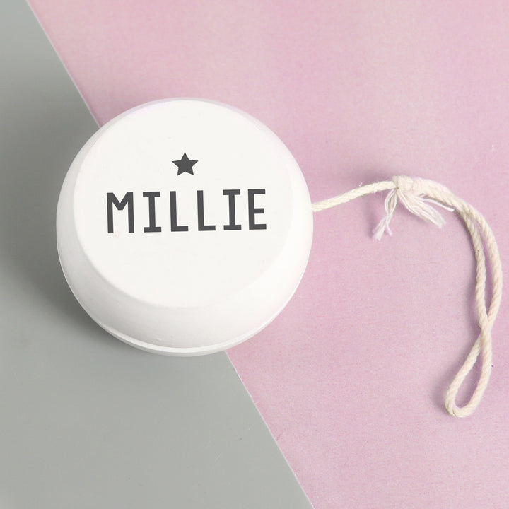 Buy Personalised Grey Star White Wooden Yoyo available now at www.giftsfinder.co.uk