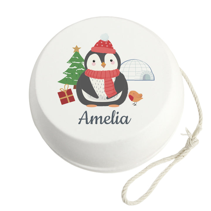 Buy Personalised Christmas Penguin White Wooden Yoyo available now at www.giftsfinder.co.uk