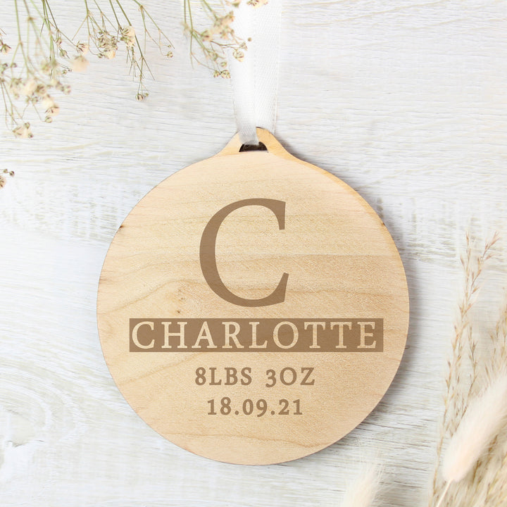 Buy Personalised Initial Round Wooden Decoration available now at www.giftsfinder.co.uk