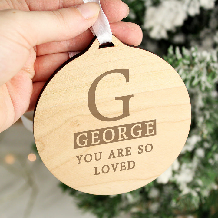 Buy Personalised Initial Round Wooden Decoration available now at www.giftsfinder.co.uk