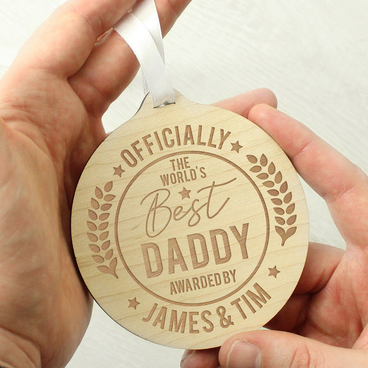 Buy Personalised Officially The Best Round Wooden Medal at www.giftsfinder.co.uk