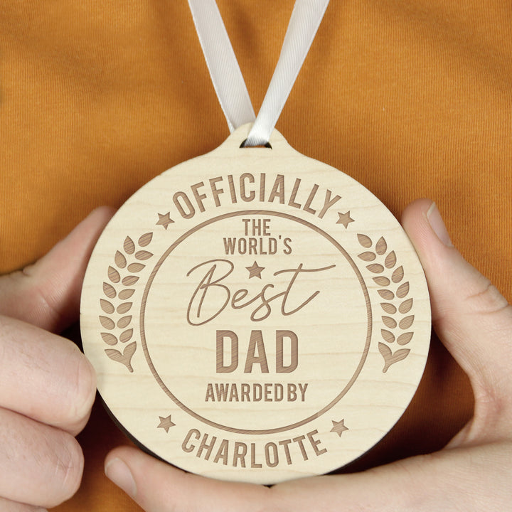 Buy Personalised Officially The Best Round Wooden Medal at www.giftsfinder.co.uk