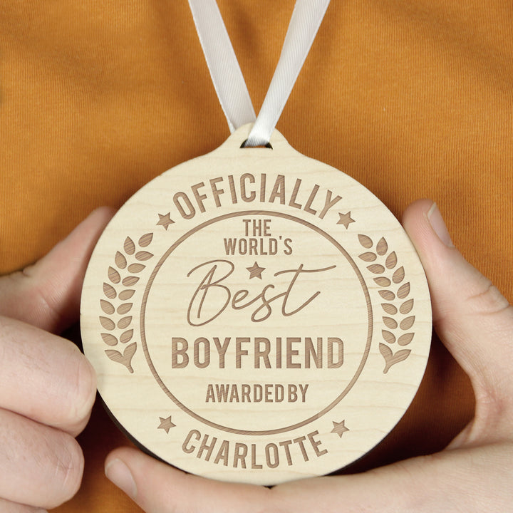 Buy Personalised Officially The Best Round Wooden Medal at www.giftsfinder.co.uk