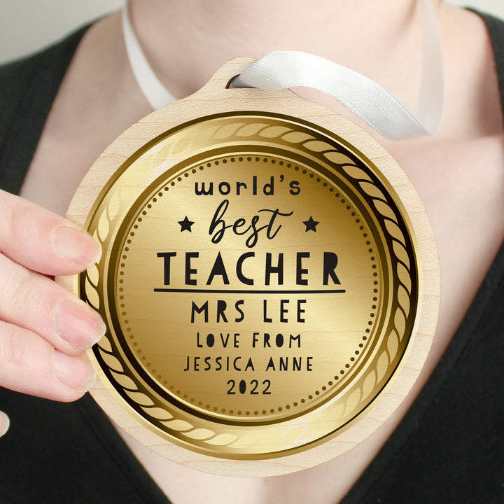 Personalised World’s Best Teacher Round Wooden Medal in gift category Personalised Teacher Gifts