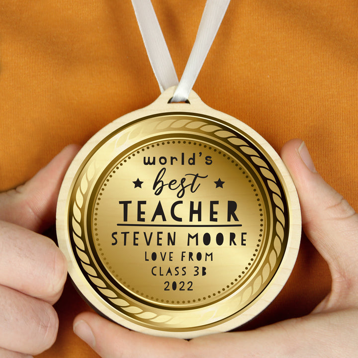 Personalised World’s Best Teacher Round Wooden Medal in gift category Personalised Teacher Gifts