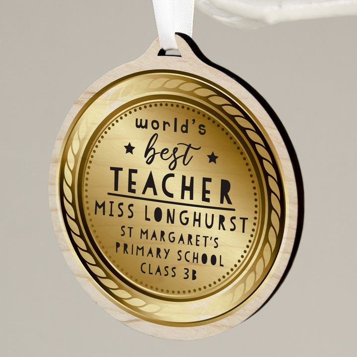 Personalised World’s Best Teacher Round Wooden Medal in gift category Personalised Teacher Gifts