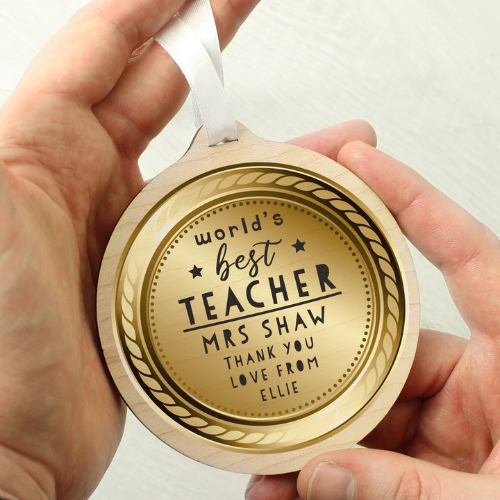 Personalised World’s Best Teacher Round Wooden Medal in gift category Personalised Teacher Gifts