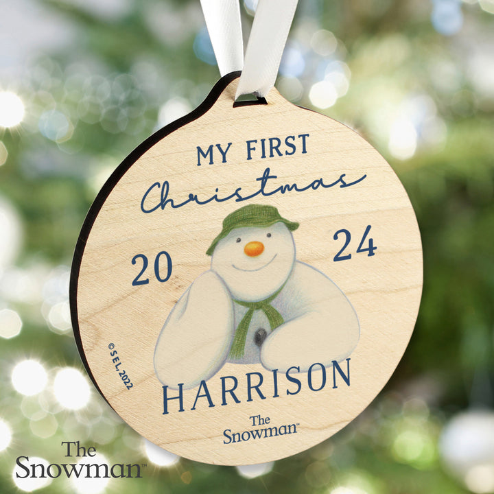 Personalised The Snowman My First Christmas Round Wooden Decoration in gift category Personalised Ornaments & Keepsakes