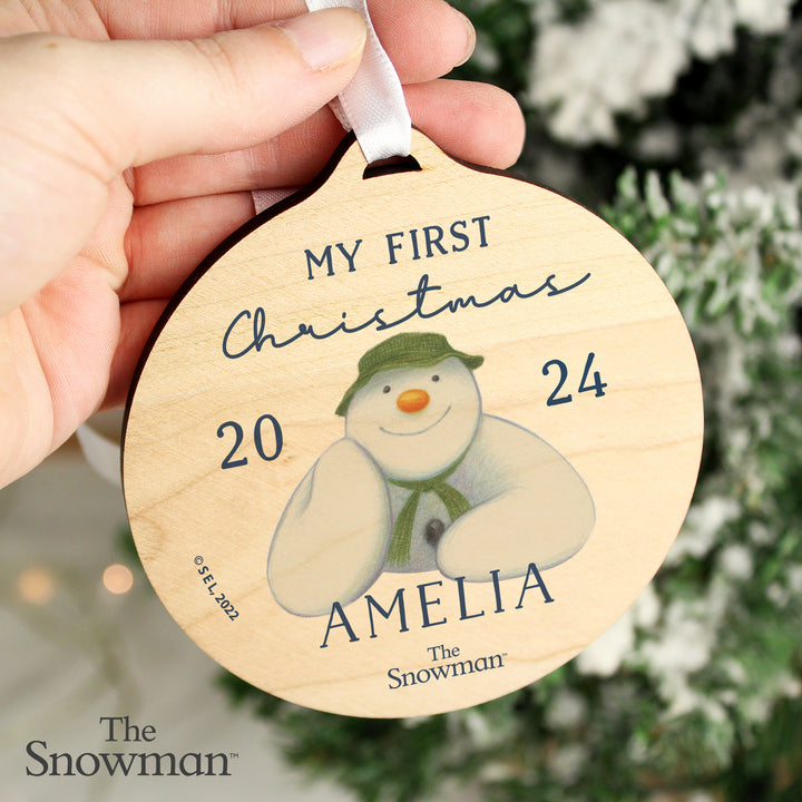 Personalised The Snowman My First Christmas Round Wooden Decoration in gift category Personalised Ornaments & Keepsakes