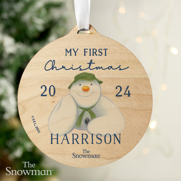 Personalised The Snowman My First Christmas Round Wooden Decoration in gift category Personalised Ornaments & Keepsakes