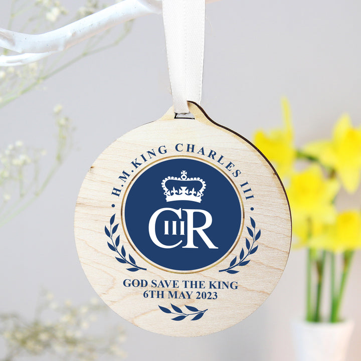 Buy King Charles III Blue Crest Coronation Commemorative Round Wooden Decoration available now at www.giftsfinder.co.uk