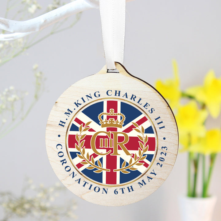 Buy King Charles III Union Jack Coronation Commemorative Round Wooden Decoration available now at www.giftsfinder.co.uk